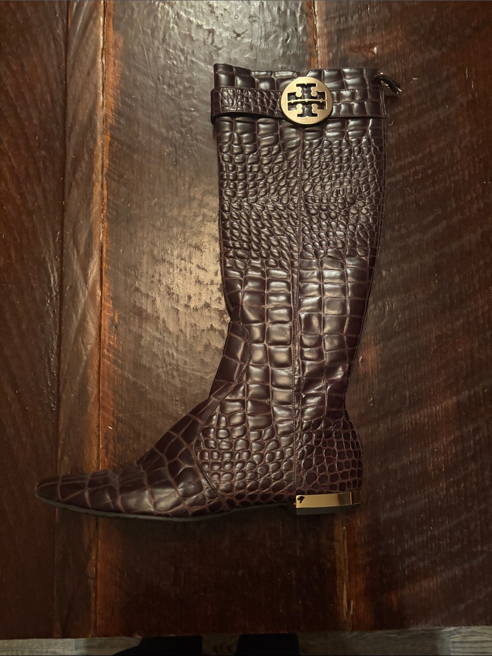 Leather Tory Burch knee high boots with gold trim